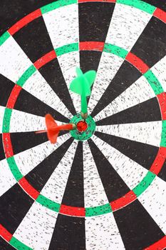 close-up.Darts game with a dart in the target center