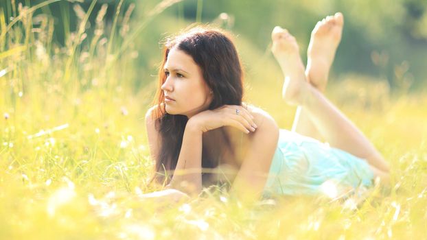 beautiful young woman. field in summer