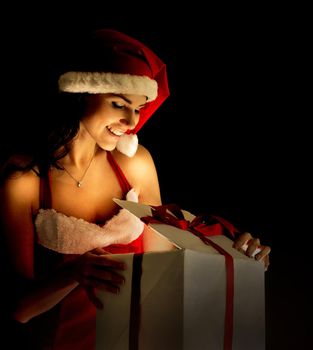 santa woman opening the magical Christmas present box