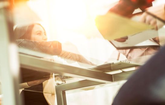 closeup of business team sitting at Desk.the photo has a empty space for your text