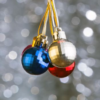 Ð¡hristmas disco balls on beautiful grey bokeh background