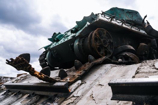 War in Ukraine. Destroyed tank on the central square in the city of Trostyanets liberated from the Russians. Russia's military invasion of Ukraine