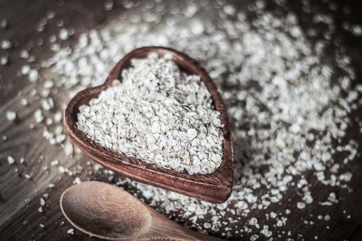 closeup.muesli with bran on a wooden table.healthy food concept