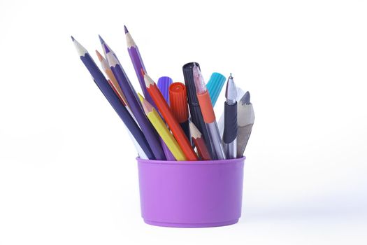 markers, pens and colored pencils.isolated on white background.photo with copy space.
