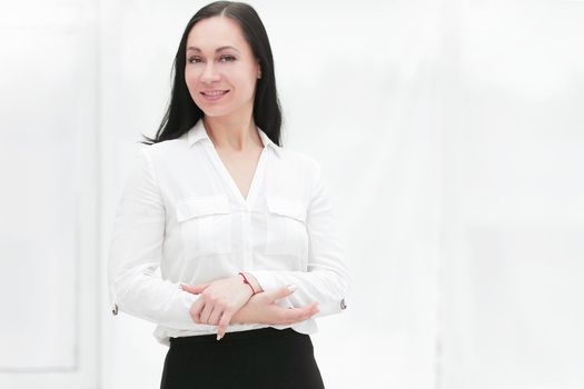 confident business woman on the background of office window.