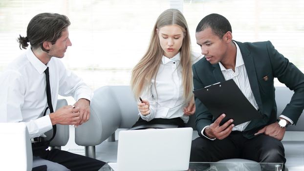 concentrated business team at the workplace thinking about business problems .photo with copy space