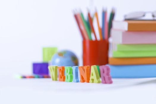 word webinar on blurred background .photo with copy space.