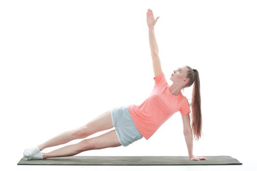 fitness woman performing exercise to strengthen the abdominal press.