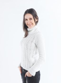 portrait of modern young woman in white sweater and jeans.isolated on white.