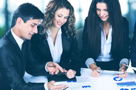 business, technology and office concept - smiling female boss talking to business team