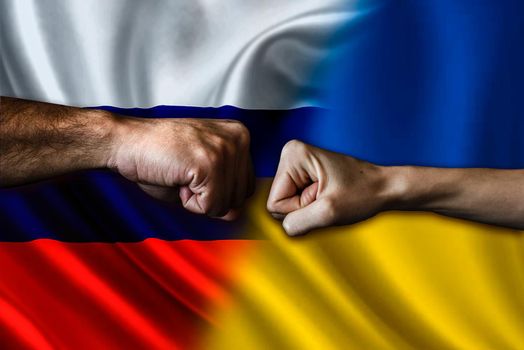 Russia vs Ukraine two fists bumping, Russia vs Ukraine political conflict, Russia vs Ukraine flag, Russia vs Ukraine concept