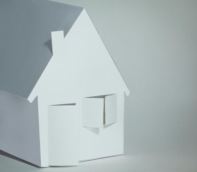 paper house paper background.the concept of a mortgage.photo with copy space