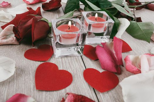 two candles on a festive wooden background. photo with copy space