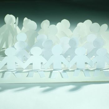 business concept.a large team of paper doll. photo with copy space