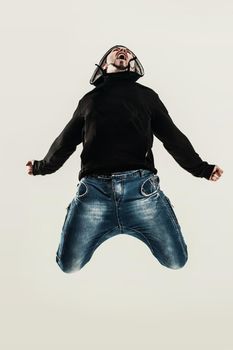 rapper dancing break dance .photo on a light background. the photo has a empty space for your text