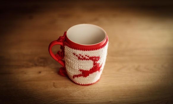 decorative Christmas Cup on wooden background.photo with copy space