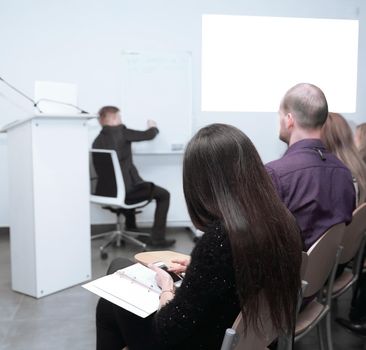 background image of a businessman speaking at a business seminar.photo with copy space