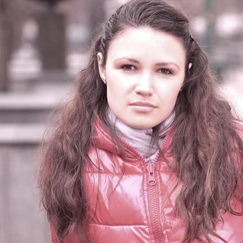 close up.portrait of a young woman on blurred background.