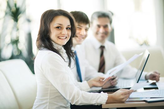 A group of businessmen discussing the policy of the company in office.