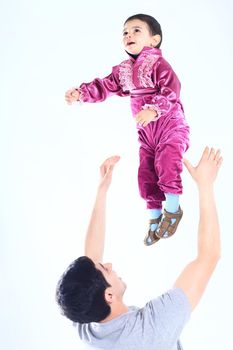 happy child.the father and the son.a child in Gypsy national costume.the photo with blank space for text