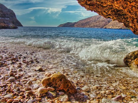 Beach with pebbles in Sifnos of Greece