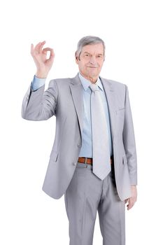 closeup.handsome senior businessman showing OK gesture.