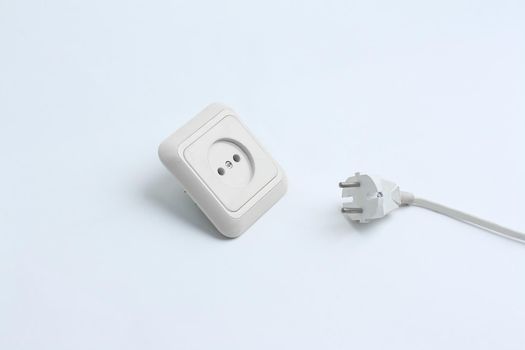 electrical outlet and plug.isolated on a white background.photo with copy space