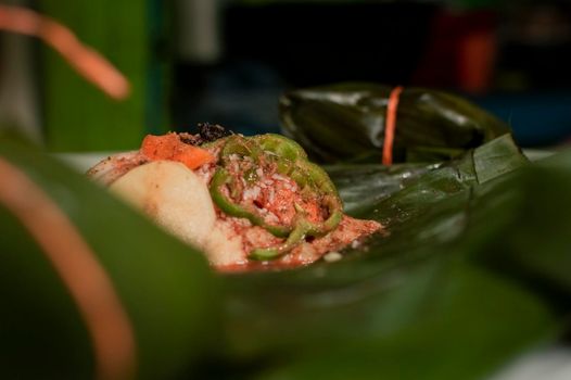 Preparation of the nacatamal, close up of the elaboration of a Nicaraguan nacatamal