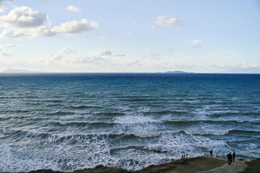 View of Logas Beach and the amazing rocky cliff in Peroulades. Corfu island. Greece.