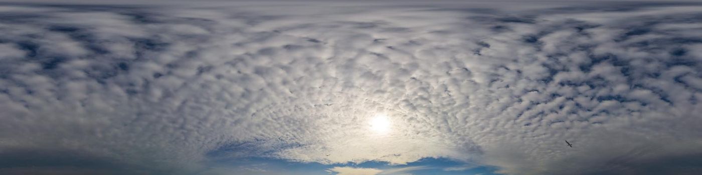 Dark blue sunset sky panorama with pink Cumulus clouds. Seamless hdr 360 pano in spherical equirectangular format. Full zenith for 3D visualization, game, sky replacement for aerial drone panoramas