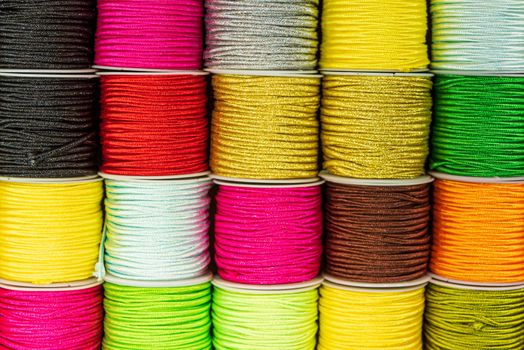 Ornamental threads for colorful jewelry making. High quality photo