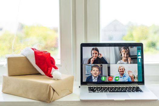 Laptop, christmas. Video call with the family in times of coronavirus