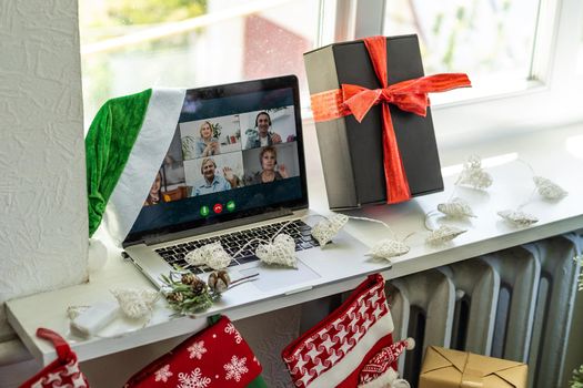 Laptop, christmas. Video call with the family in times of coronavirus