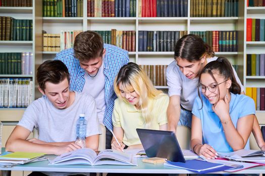 Group of teenage students study in library class. High school, education, adolescent, back to school, back to college concept