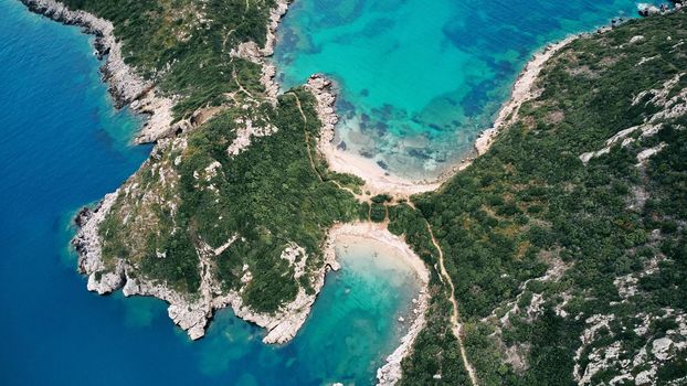 Aerial view of Porto Timoni beach and pirate bay on Corfu island in Greece. Ionian sea.