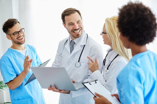 Portrait of a group of doctors and health care workers at meeting