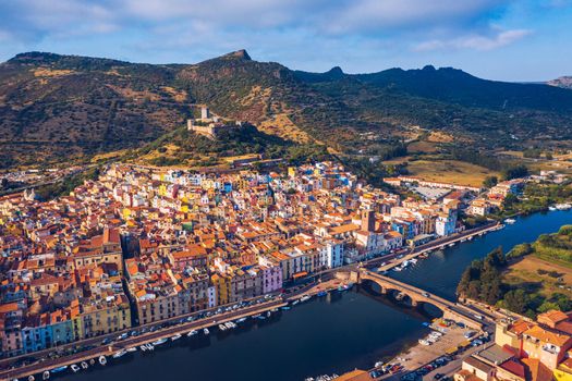 Beautiful view of Bosa town, Sardinia island, Italy. Travel destination. Bosa town with Ponte Vecchio bridge across the Temo river. Marvelous morning view of Sardinia island, Italy, Europe.