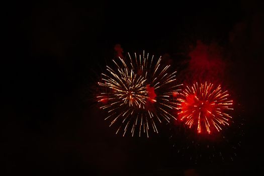 Beautiful salute on a black isolated background. Place for your text. Celebrating New Year or Independence Day.