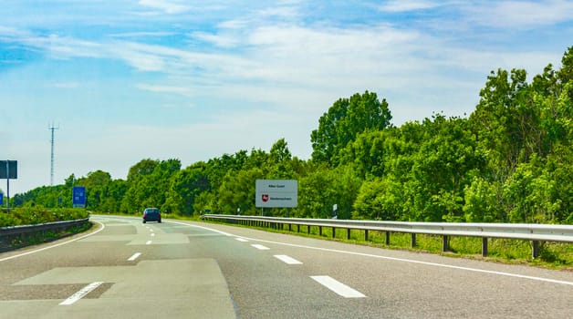 Lower Saxony Germany 18. June 2013 Driving on the German highway view from the interior of the car from Lower Saxony Germany to Netherlands.