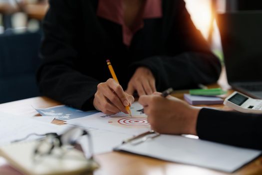 Group of Asian Business people consult advice about finance plan. Account concept