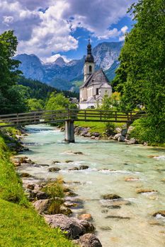 Parish Church of St. Sebastian in the village of Ramsau, Nationalpark Berchtesgadener Land, Upper Bavaria, Germany. Colorful view of Parish Church of St. Sebastian, Ramsau bei Berchtesgaden, Germany.