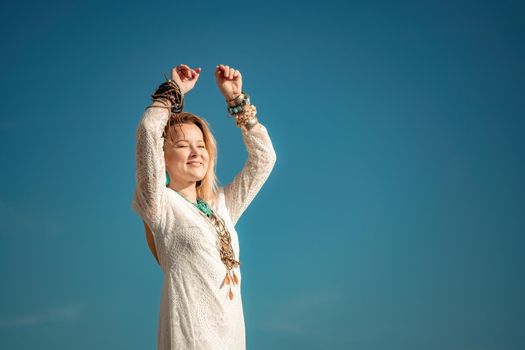 fashionable young model in boho style dress