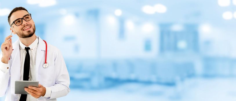 Doctor using tablet computer at the hospital. Medical healthcare and doctor staff service.