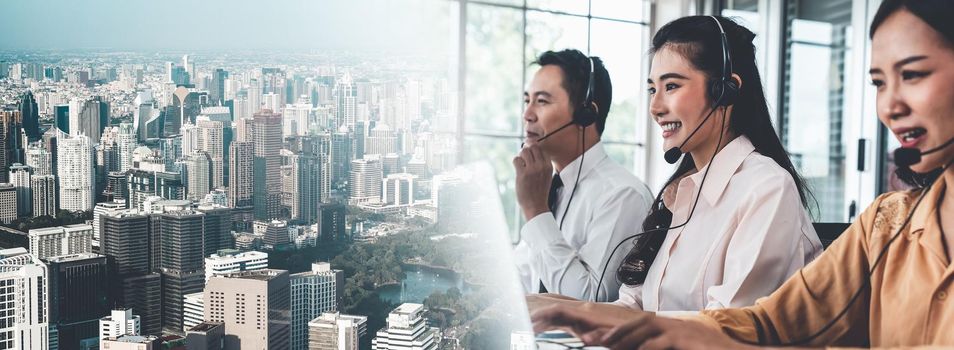 Business team wearing headset working actively in office . Call center, telemarketing, customer support agent provide service on telephone video conference call.