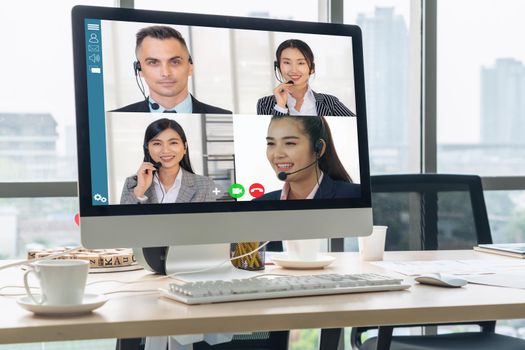 Video call business people meeting on virtual workplace or remote office. Telework conference call using smart video technology to communicate colleague in professional corporate business.