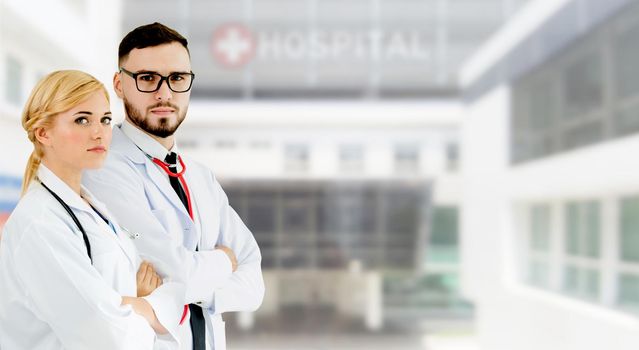 Doctor working with another doctor in the hospital. Healthcare and medical service.