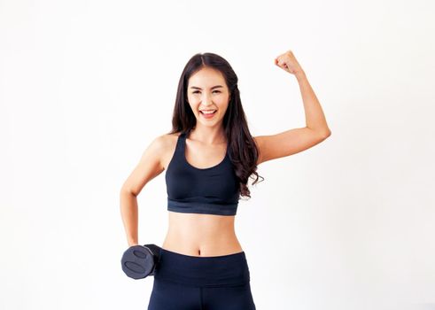 Sporty woman workout with dumbbell on clear background. Healthy lifestyle and exercising.