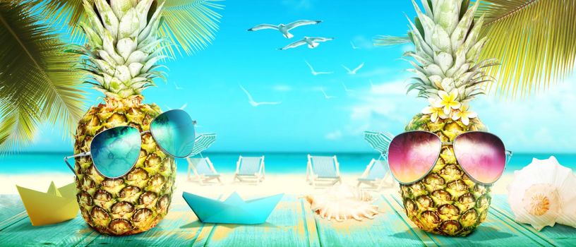 Tropical summer vacation concept with funny pineapple.