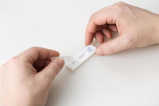 Covid rapid antigen nasal test. Self test at home or at corona test station.