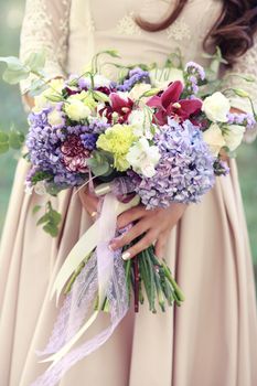 wedding bouquet in bride's hands